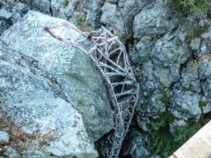 The old bridge was mangled by an avalanche years ago