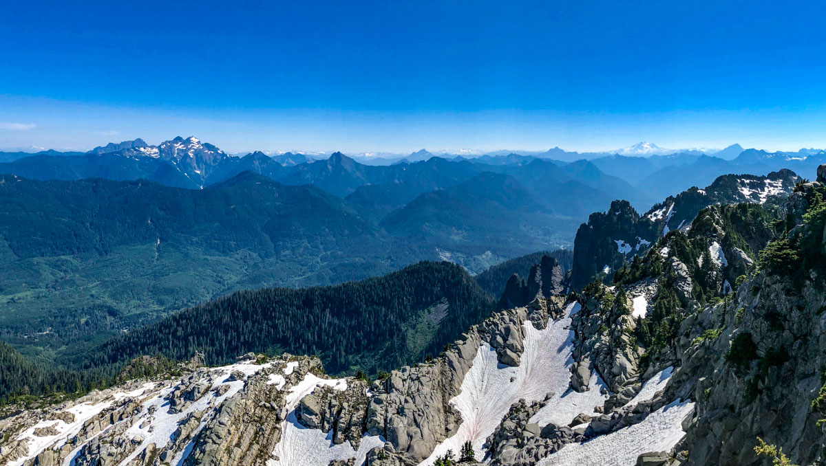 Snow on the side of Pilchuck and mountains for miles