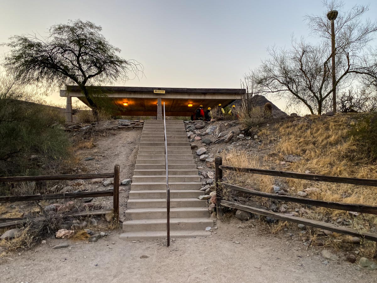 Steps up from parking to a picnic shade structure